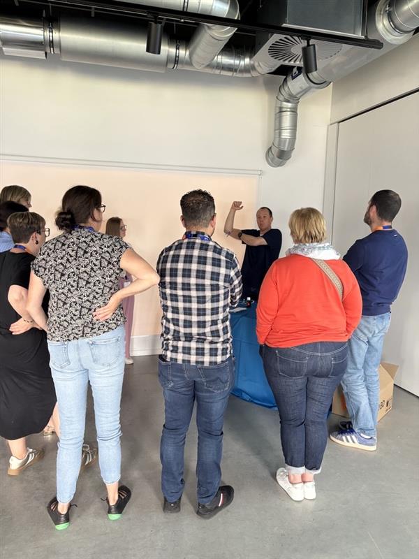 People standing and listening