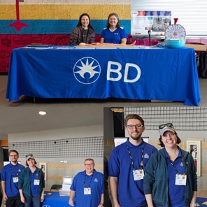 BD information booth with event staff