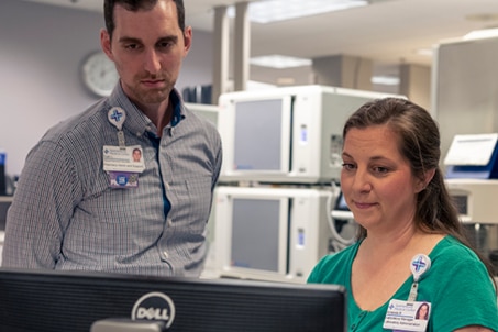 Lab Staff at Computer