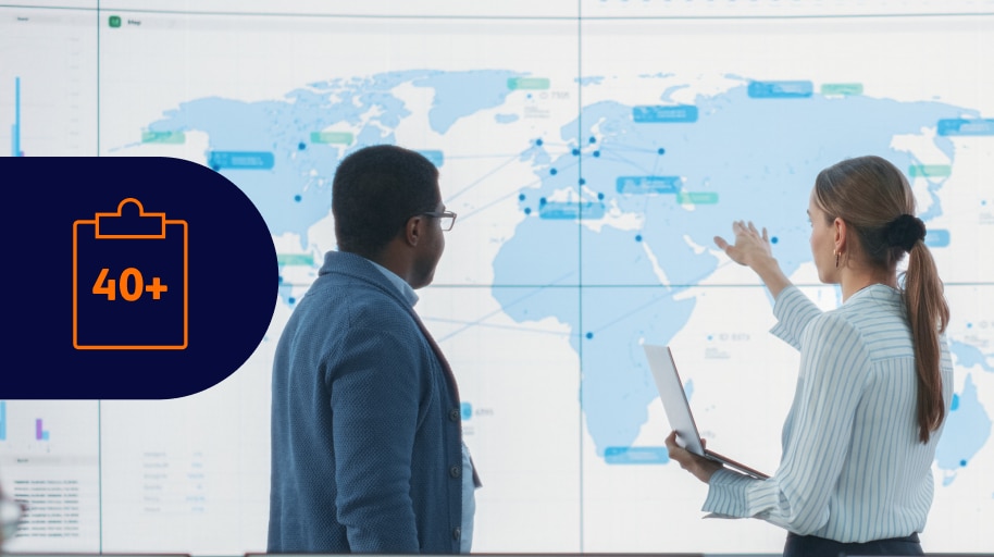 Business professionals analyzing global data