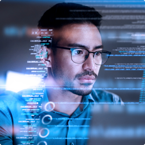 Programmer analyzing code on screen