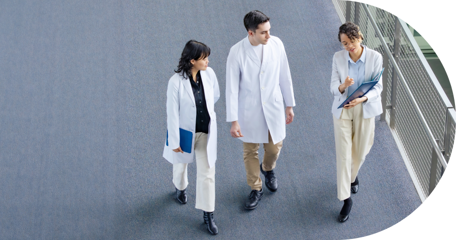 Medical professionals walking in hospital corridor