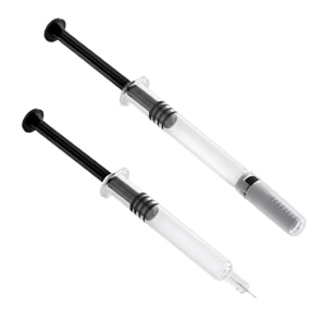 Two clear medical syringes on white background