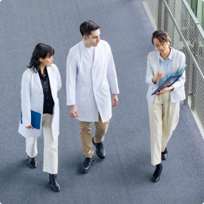 Medical professionals walking in hospital corridor