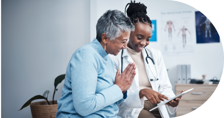Patient consulting with doctor in medical office