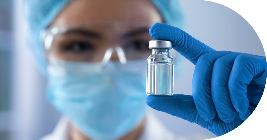 Scientist holding medical vial in laboratory