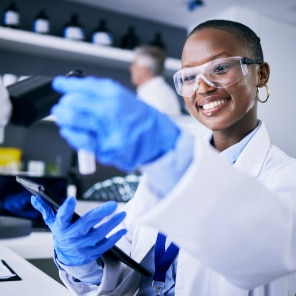 Scientist using tablet in modern laboratory