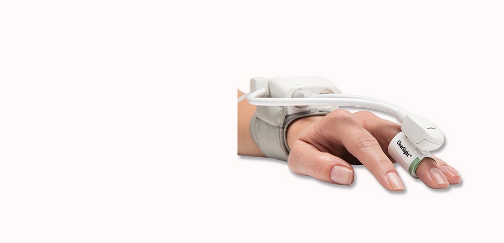Doctor and patient with ClearSight Jr finger cuff
